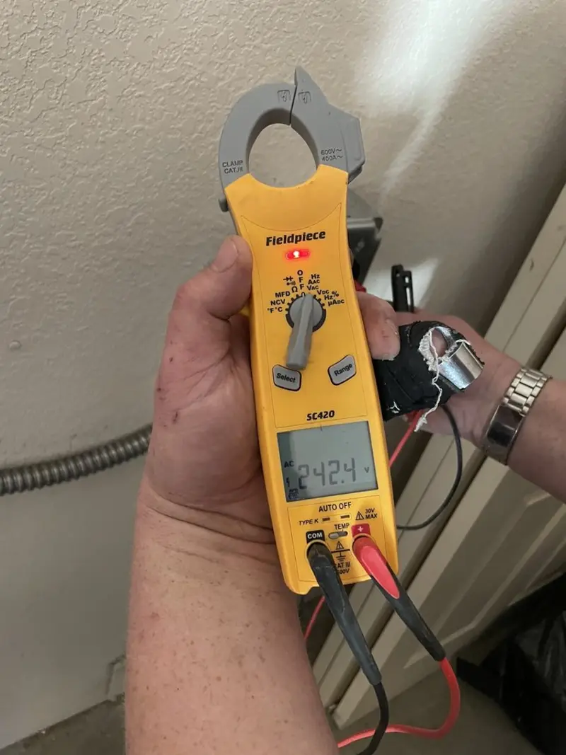 Voltage testing with clamp meter during Electrical Installation Services in Owings Mills